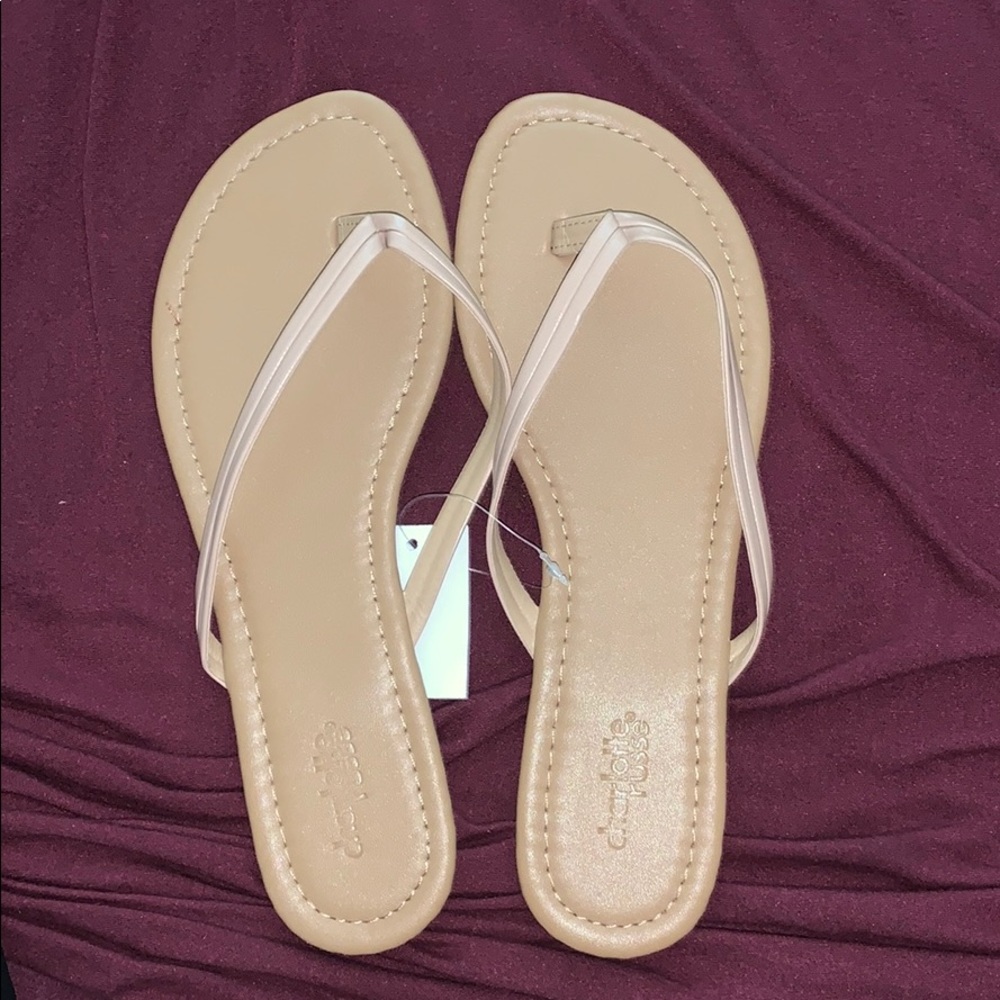 Tan flip flops